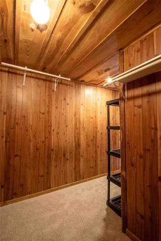 a view of empty room with floor to ceiling window