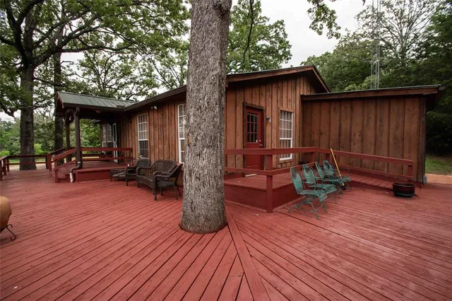 a backyard of a house with seating space