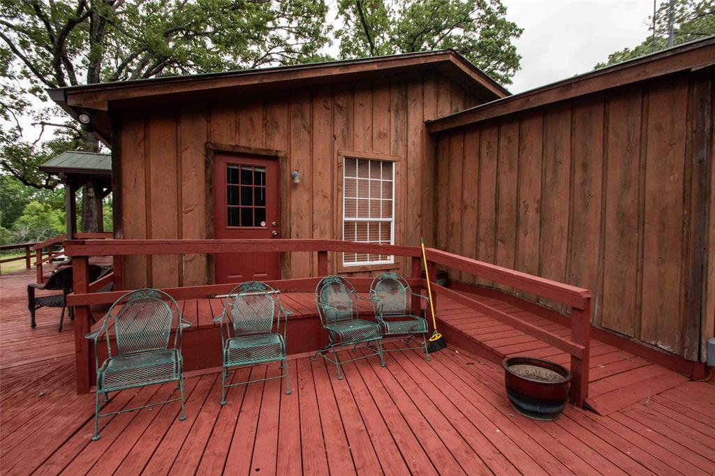 3389 Pvt Road Van, TX 75790 - Photo 18 of 31 a backyard of a house with seating space