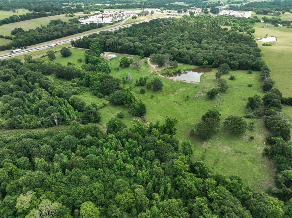 3389 Pvt Road Van, TX 75790 - Photo 31 of 31 an aerial view of residential houses with outdoor space and trees