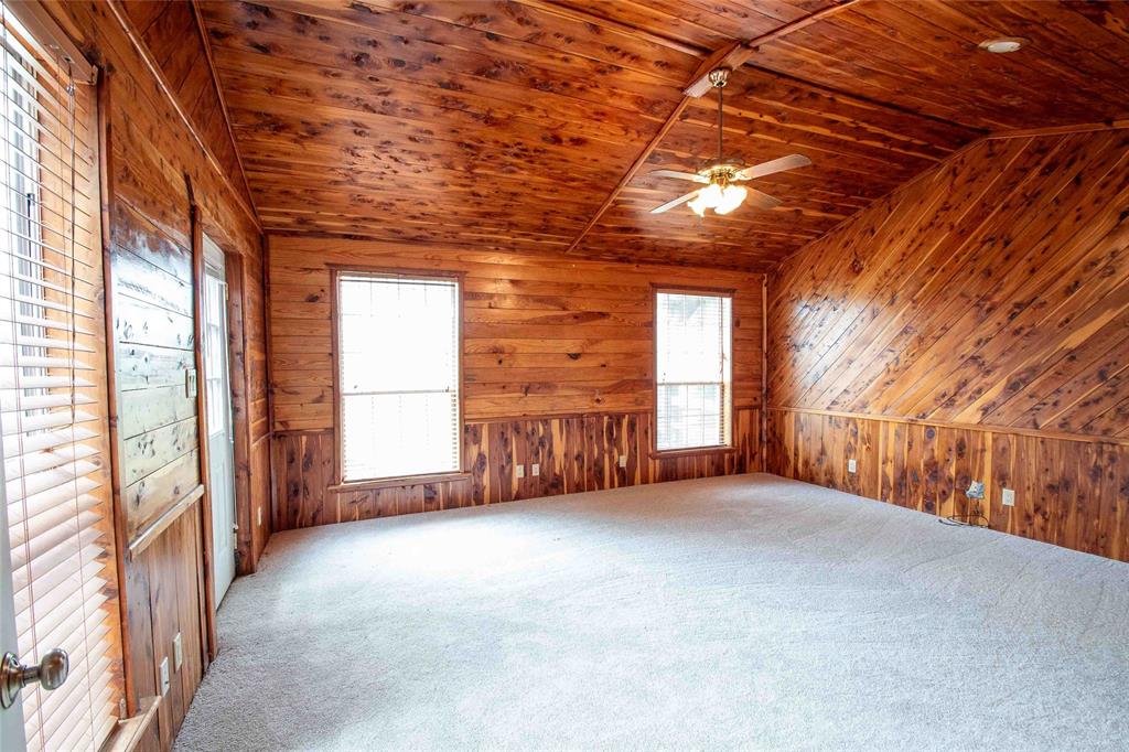 3389 Pvt Road Van, TX 75790 - Photo 9 of 31 a view of a room with large windows