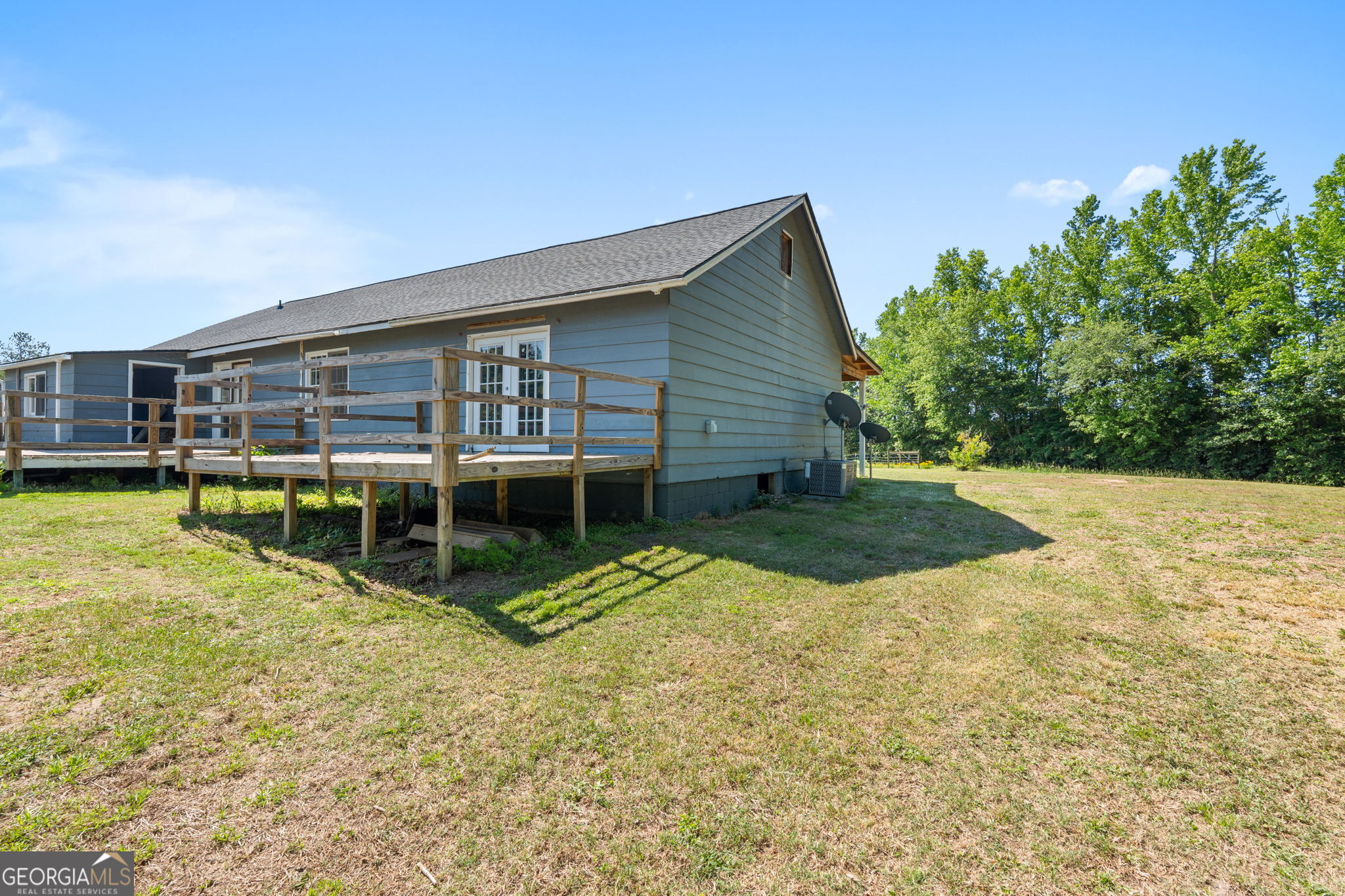 49 Frost Road Bowdon, GA 30108 - Photo 37 of 60 a view of a house with yard and sitting area