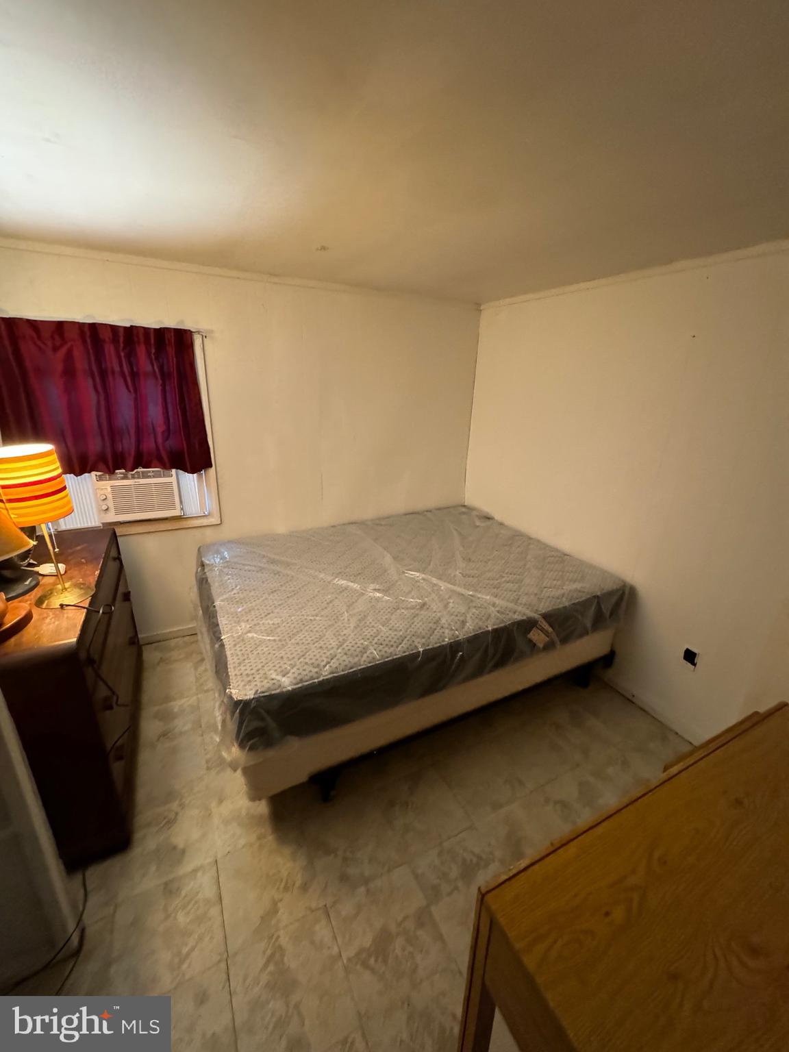 362 Oak Hill Road Moorefield, WV 26836 - Photo 31 of 132 a bedroom with a bed and a dresser