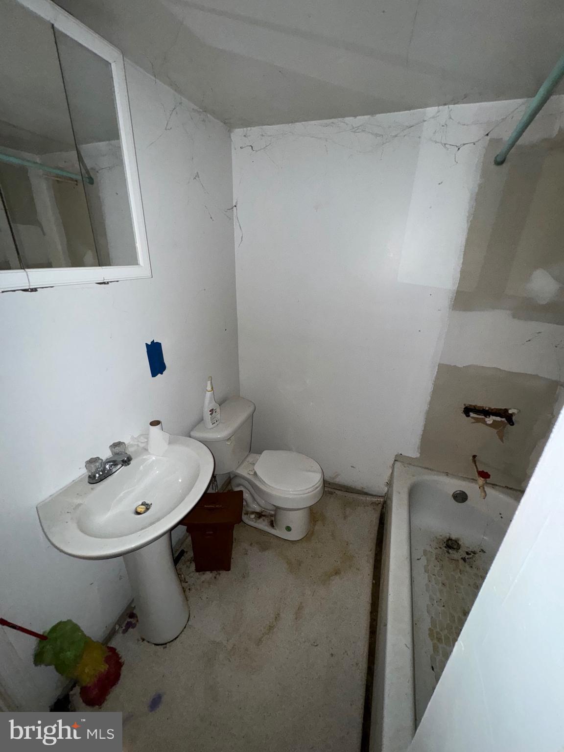 362 Oak Hill Road Moorefield, WV 26836 - Photo 33 of 132 a bathroom with a sink toilet and vanity