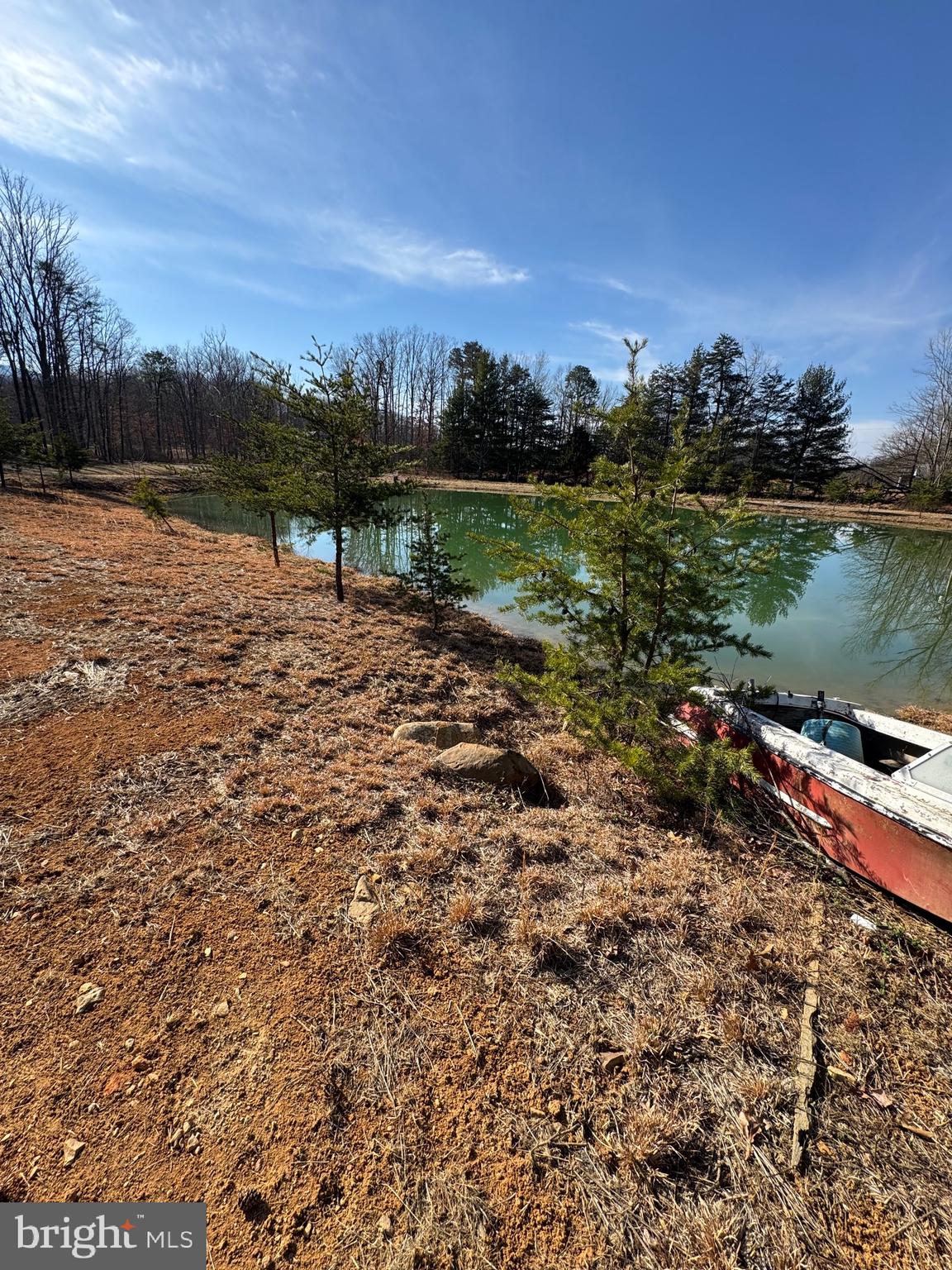 362 Oak Hill Road Moorefield, WV 26836 - Photo 57 of 132 a view of a lake with houses in the back