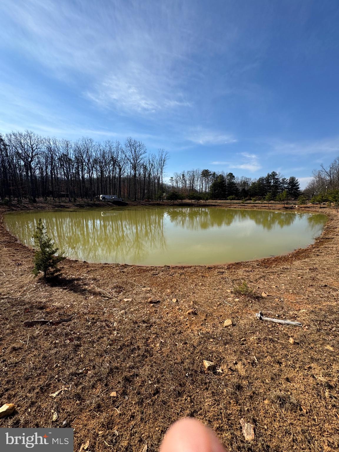 362 Oak Hill Road Moorefield, WV 26836 - Photo 9 of 132 a view of a lake with houses in the back