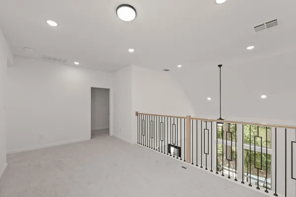 a view of a hallway with entryway
