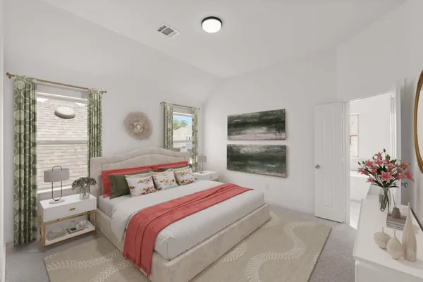 a bedroom with a bed and a potted plant