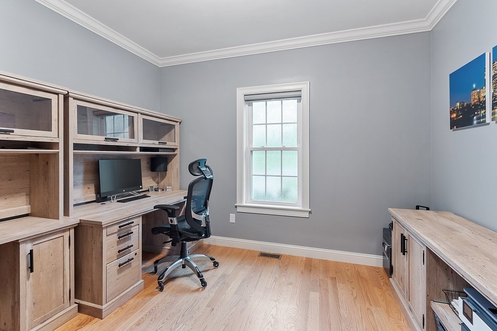 64 Mill Pond Road Bolton, MA 01740 - Photo 14 of 41 a view of a workspace with furniture and a window
