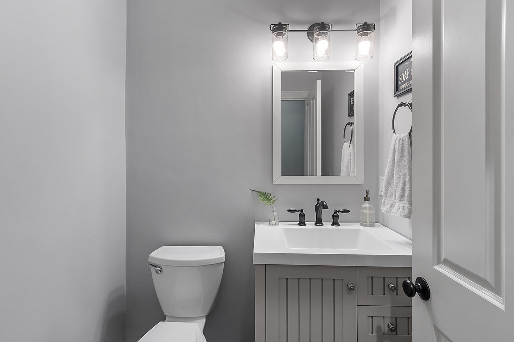 64 Mill Pond Road Bolton, MA 01740 - Photo 17 of 41 a bathroom with a sink and mirror
