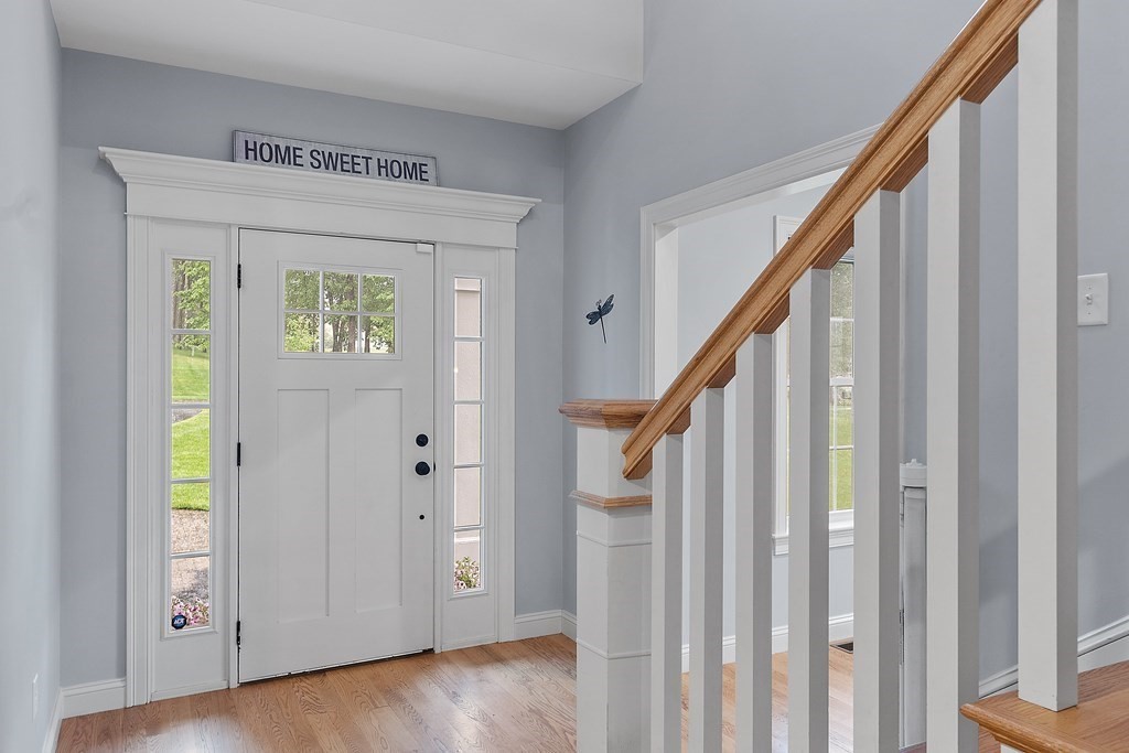 64 Mill Pond Road Bolton, MA 01740 - Photo 2 of 41 a view of an entryway with wooden floor