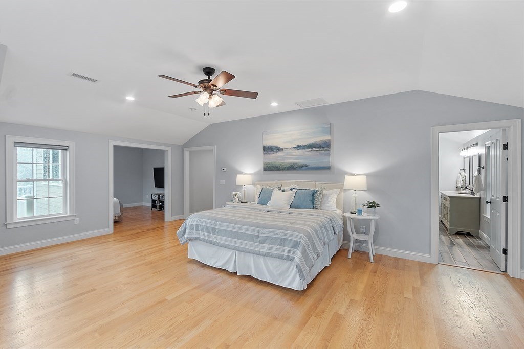 64 Mill Pond Road Bolton, MA 01740 - Photo 22 of 41 a bedroom with a bed chandelier and a window