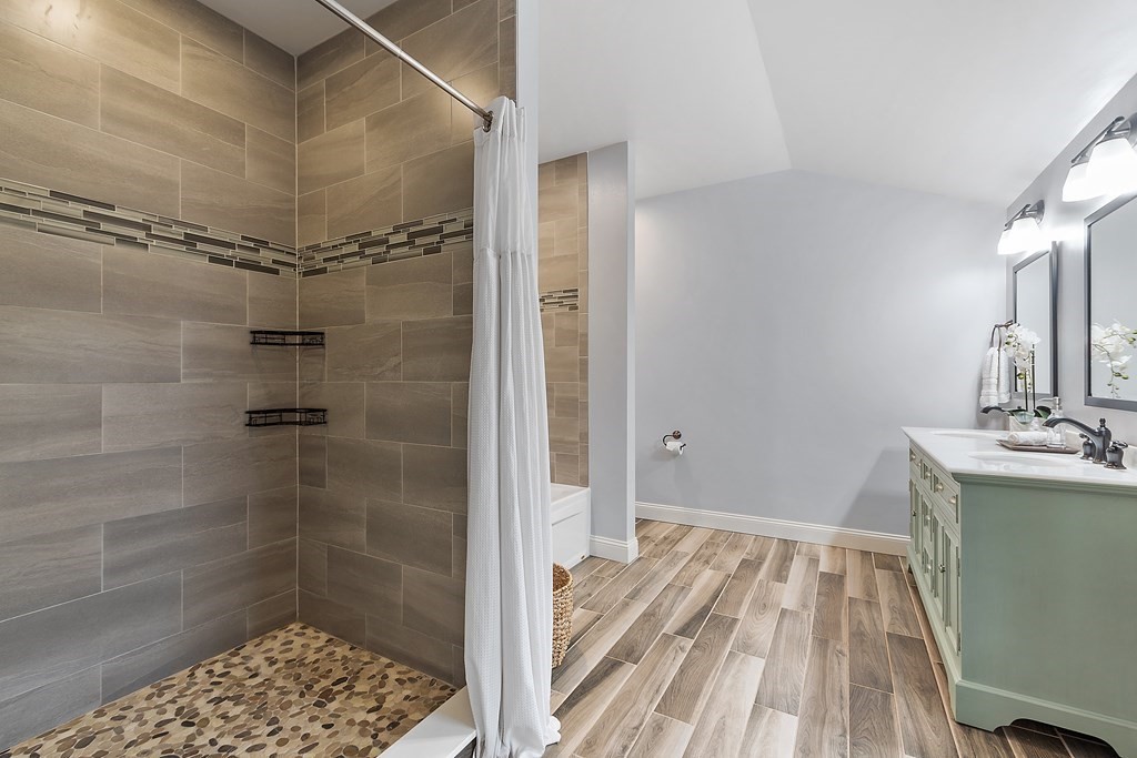 64 Mill Pond Road Bolton, MA 01740 - Photo 24 of 41 a bathroom with a sink and a shower