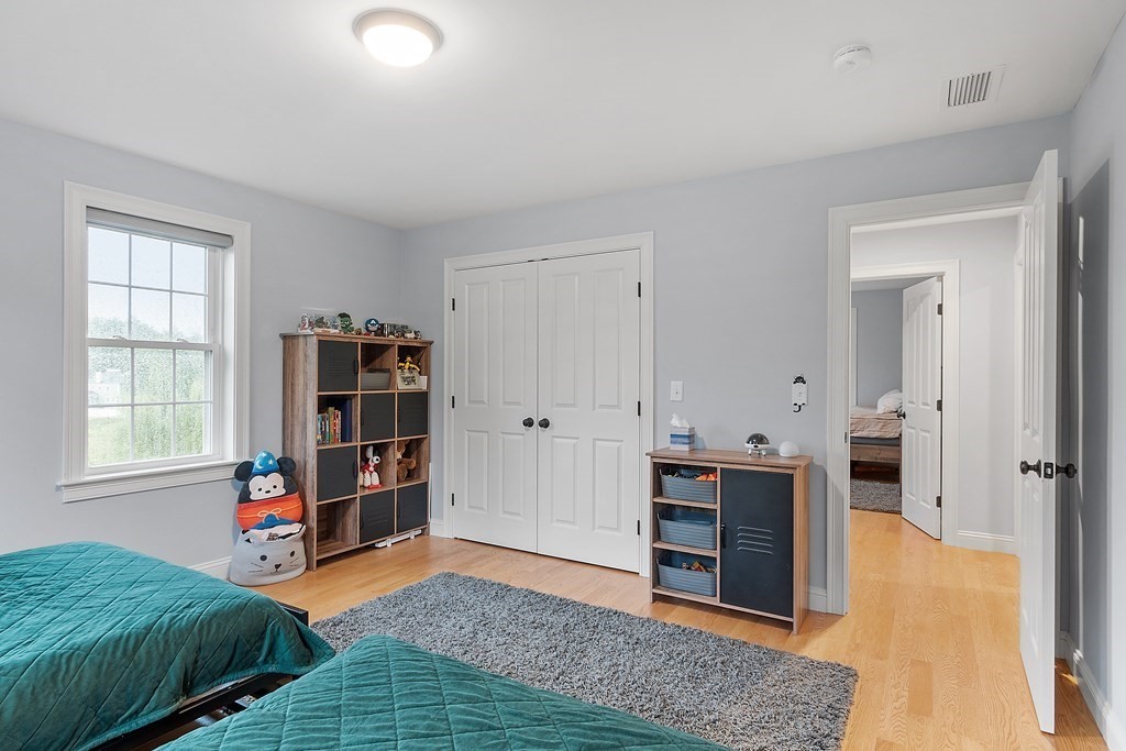 64 Mill Pond Road Bolton, MA 01740 - Photo 27 of 41 a view of a bedroom with furniture and closet