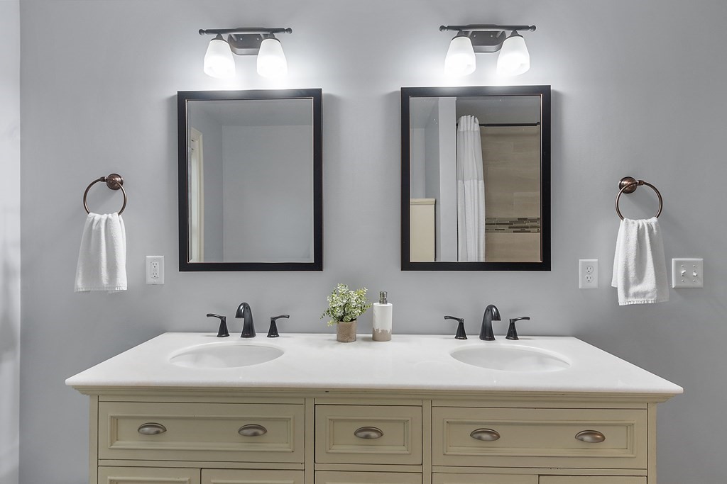 64 Mill Pond Road Bolton, MA 01740 - Photo 30 of 41 a bathroom with double sink and a mirror