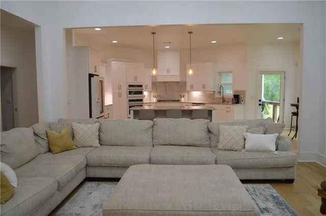 a living room with a christmas tree