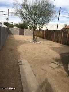 a view of back yard of the house