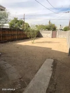 a view of swimming pool with outdoor seating and city view