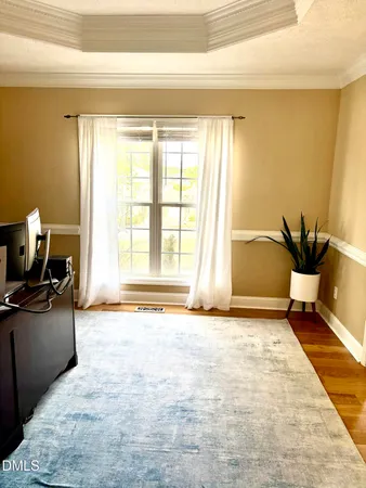 a bathroom with a shower and a glass door