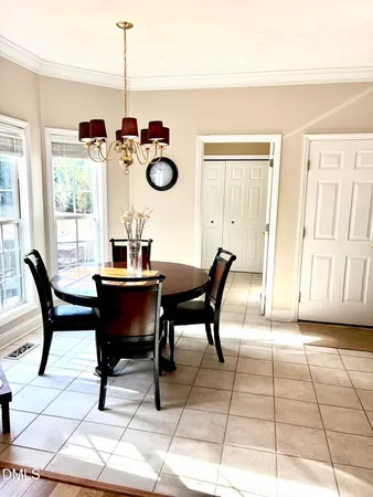 a kitchen with stainless steel appliances kitchen island granite countertop a refrigerator and a sink
