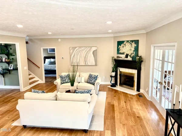 a view of a dining room with furniture and a rug