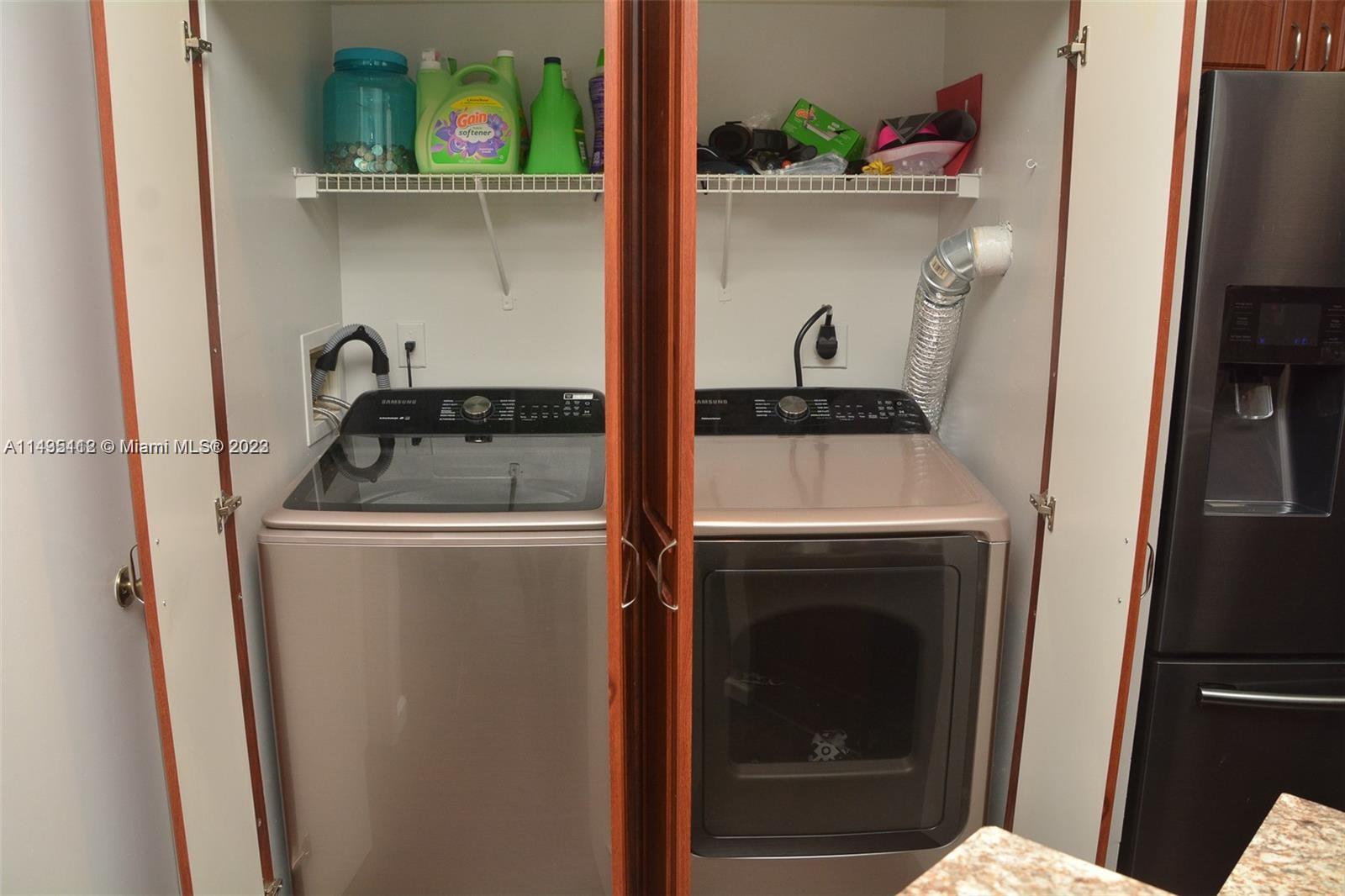 1990 Southwest 103rd Terrace Miramar, FL 33025 - Photo 12 of 19 a utility room with dryer and washer