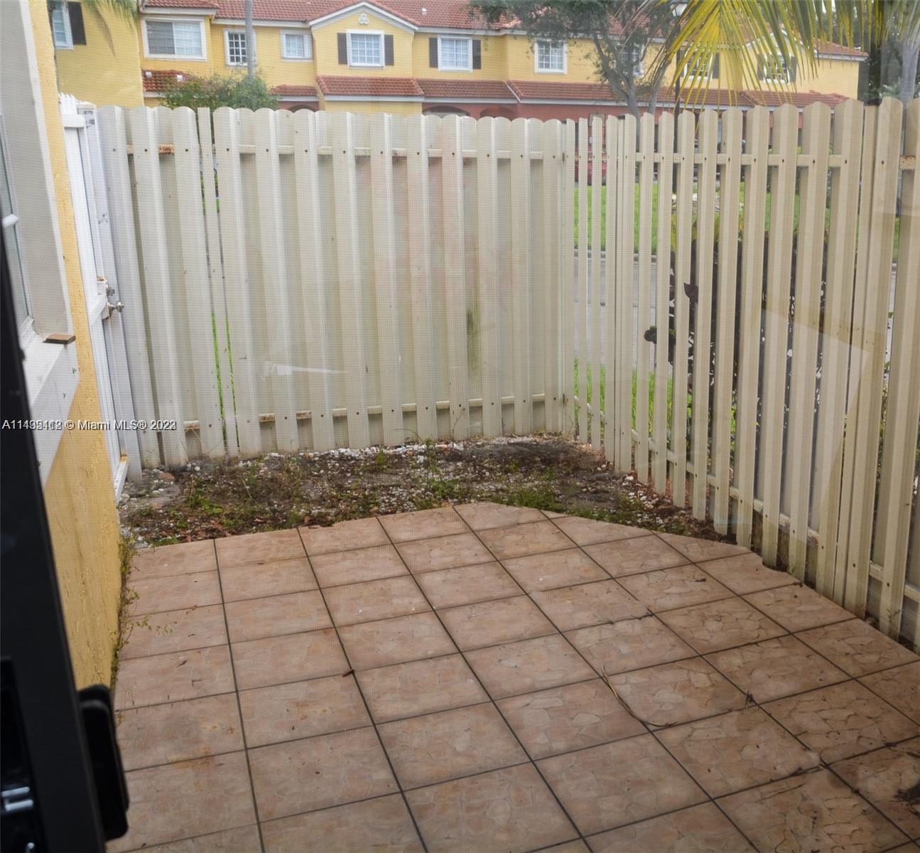 1990 Southwest 103rd Terrace Miramar, FL 33025 - Photo 19 of 19 a view of a backyard of the house