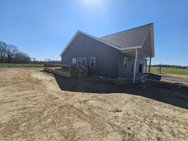 a view of ocean with a yard
