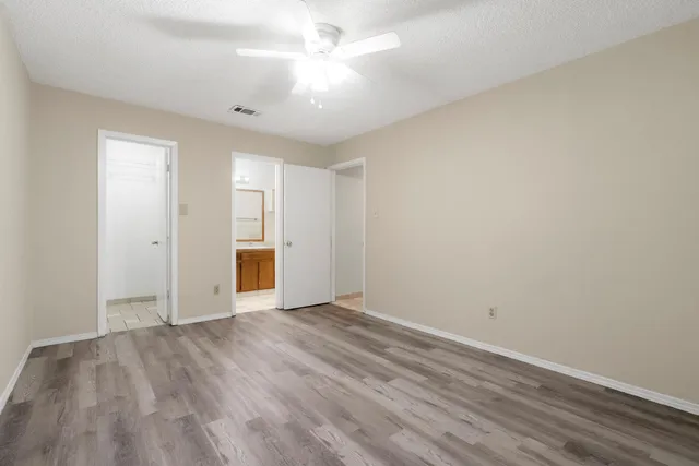 a view of a room with racks on the wall