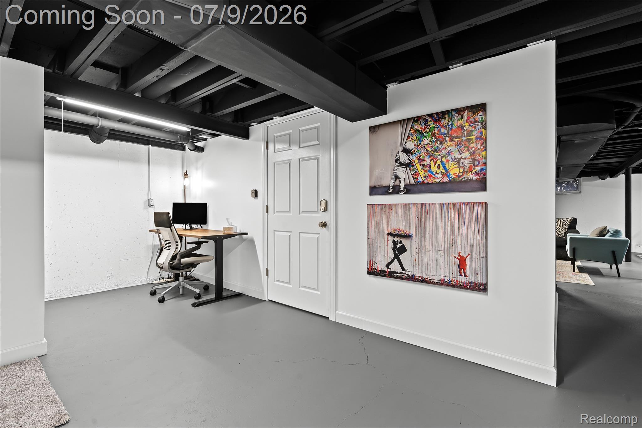 2566 Harrington Road Rochester, MI 48307 - Photo 49 of 64 Second office space featuring and adjustable height desk, luxury office chair, additional monitor on concrete flooring