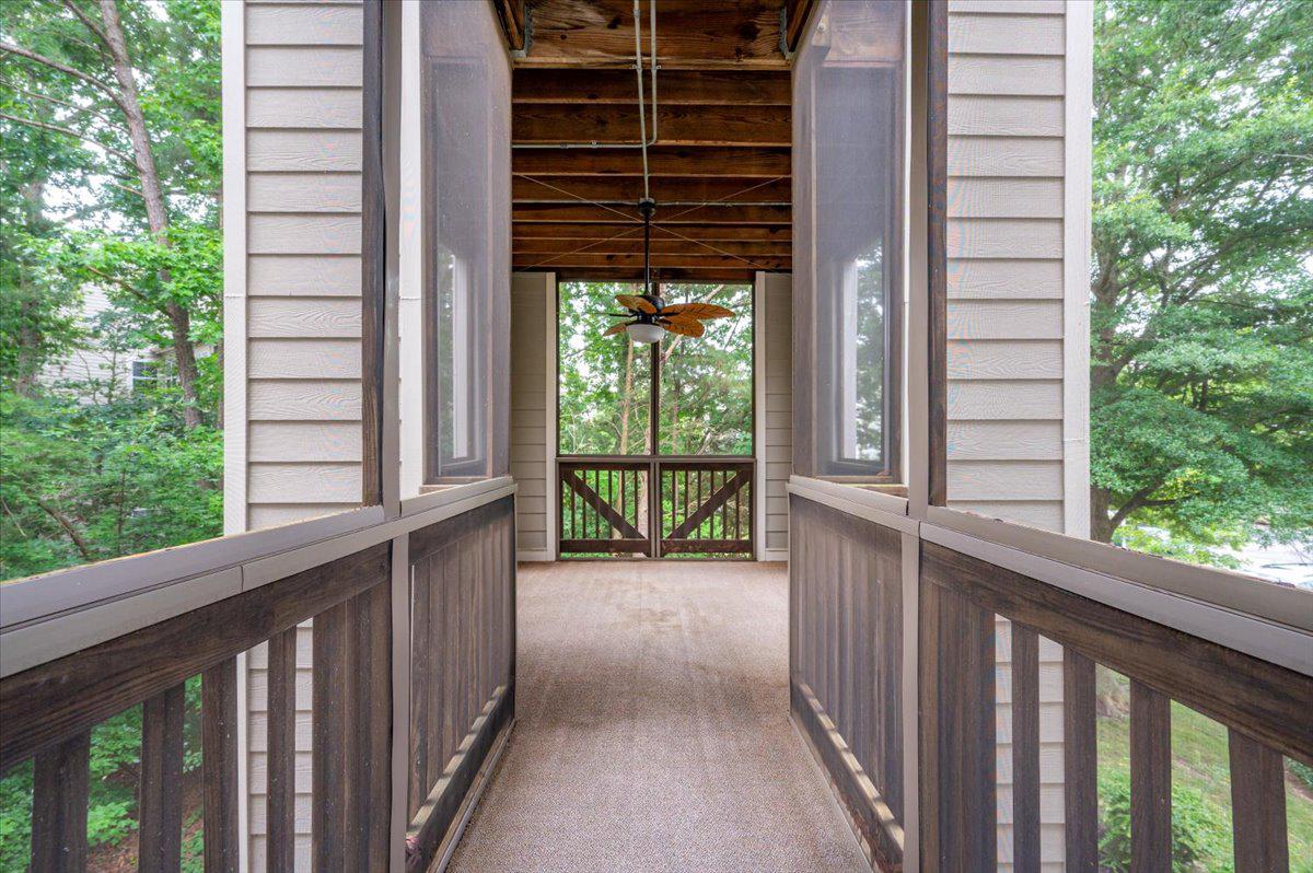 921 Spinnaker Way, Unit 921 Solomons, MD 20688 - Photo 3 of 10 Tranquil screened deck w/ woods & water views.