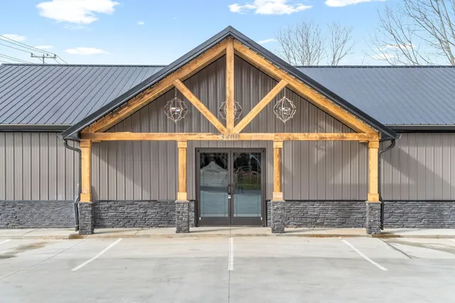 a front view of a house with garage