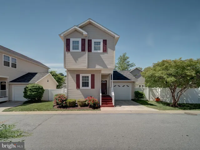 front view of a house with a street