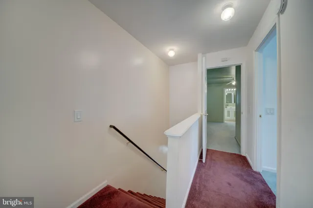 a view of hallway with stairs