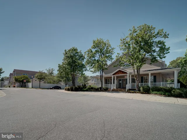 a view of a swimming pool and a yard
