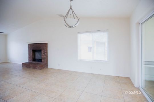 437 Emily Street Ridgecrest, CA 93555 - Photo 11 of 28 a view of an empty room with glass door
