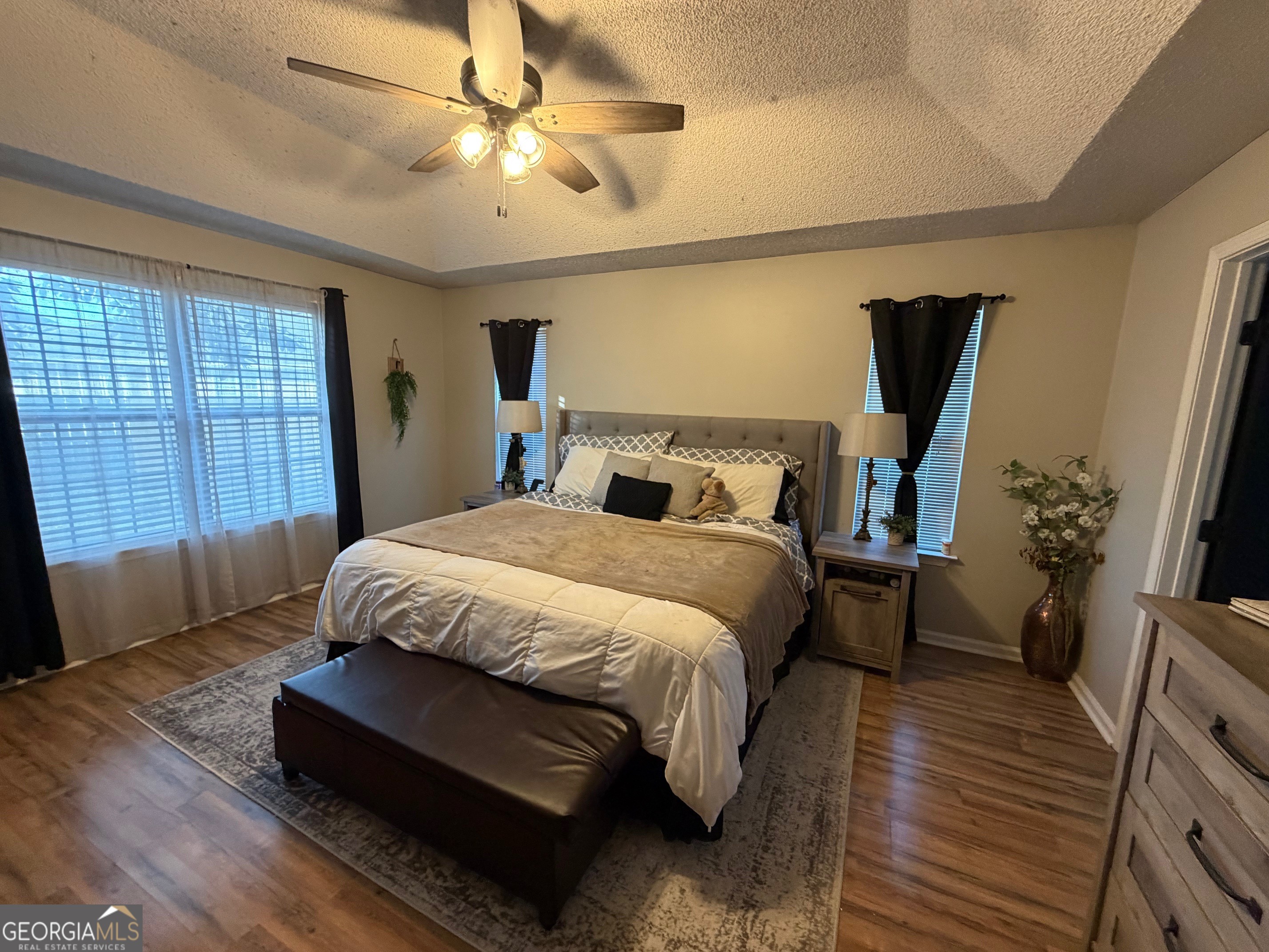 202 Bent Tree Court St. Marys, GA 31558 - Photo 12 of 25 a bedroom with a bed couch and window