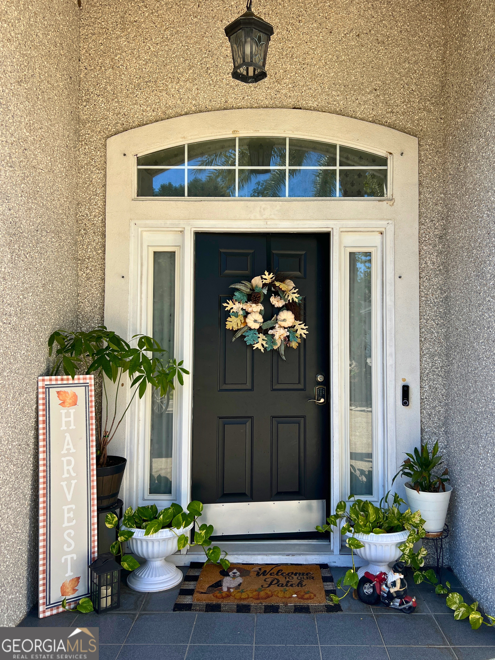 202 Bent Tree Court St. Marys, GA 31558 - Photo 2 of 25 a front view of a house with a porch