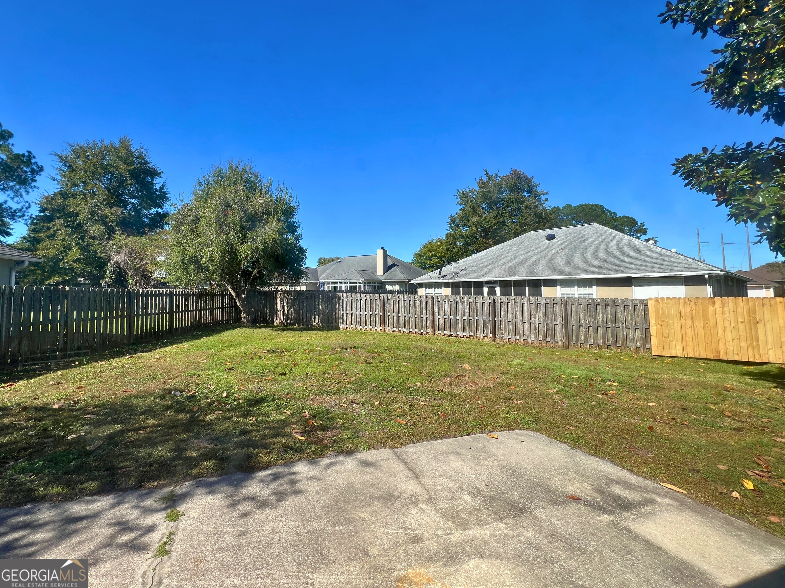 202 Bent Tree Court St. Marys, GA 31558 - Photo 25 of 25 a view of a house with backyard and sitting area