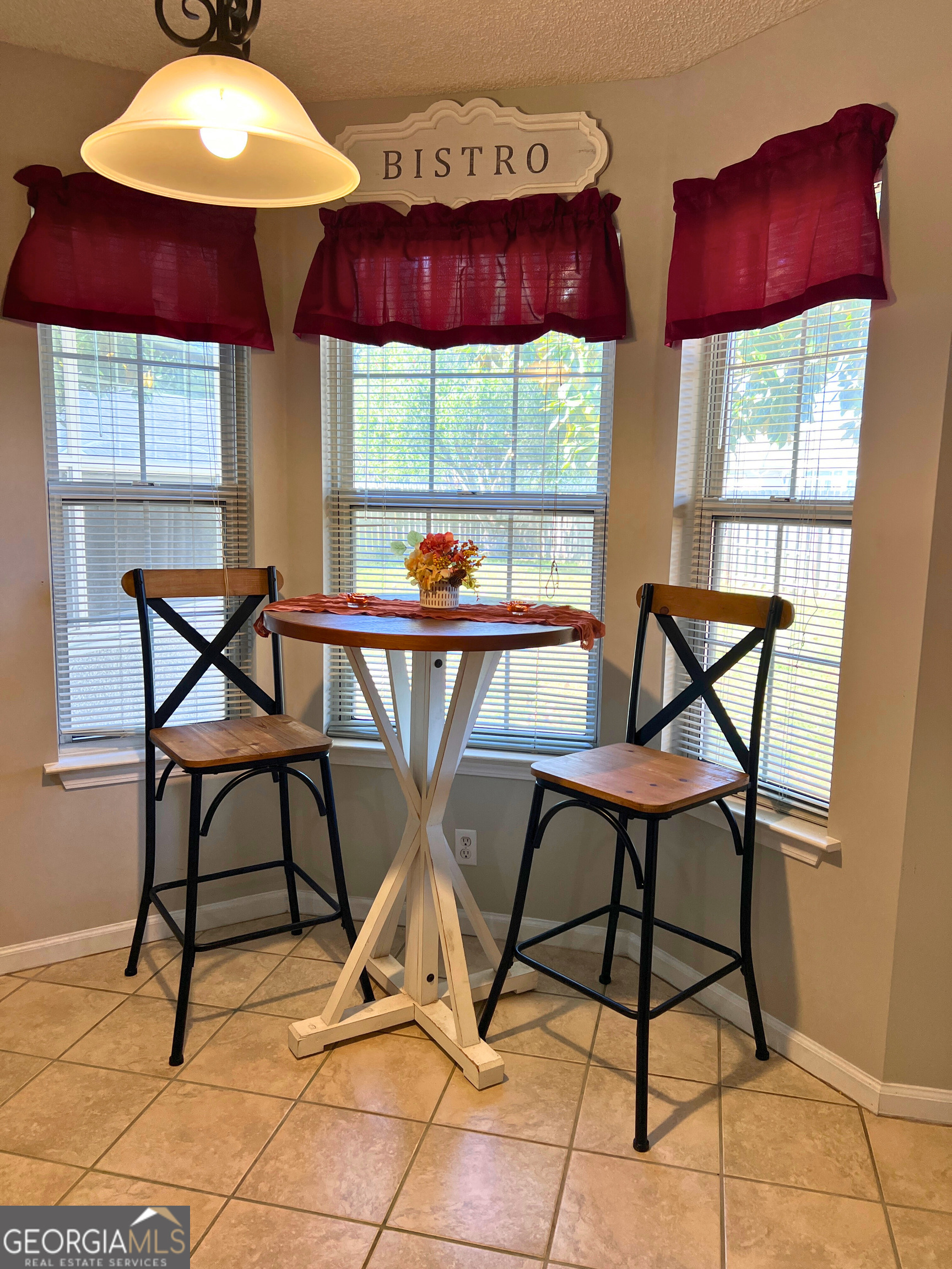 202 Bent Tree Court St. Marys, GA 31558 - Photo 9 of 25 a view of a dining room with furniture window and outside view