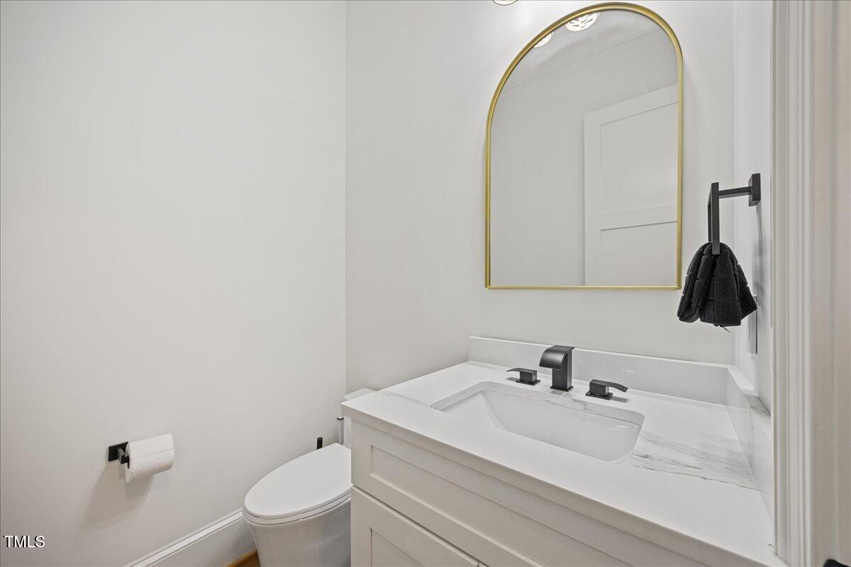 940 Rivers Edge Drive Graham, NC 27253 - Photo 20 of 41 half bath downstairs