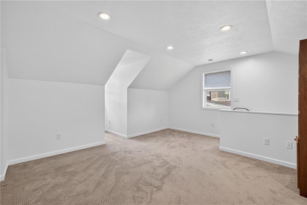 4536 Friendship Avenue Pittsburgh, PA 15224 - Photo 28 of 38 an empty room with windows