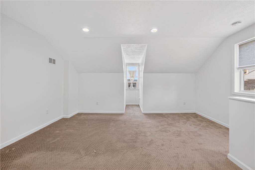 4536 Friendship Avenue Pittsburgh, PA 15224 - Photo 30 of 38 an empty room with windows