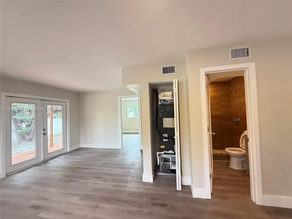 wooden floor and windows in a room