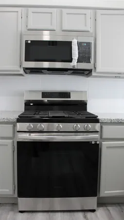 a view of wooden floor and window