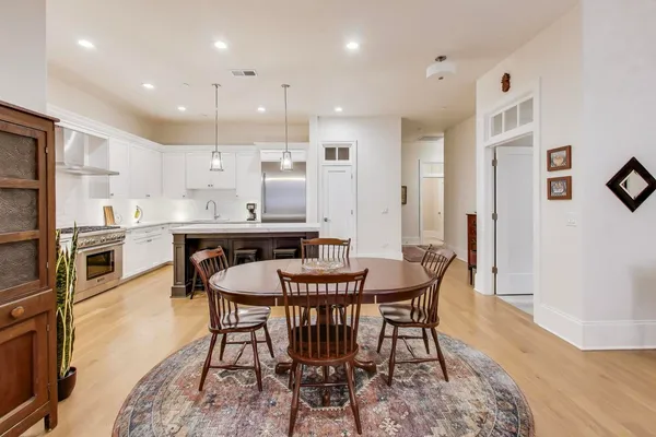 a view of a dining room with furniture