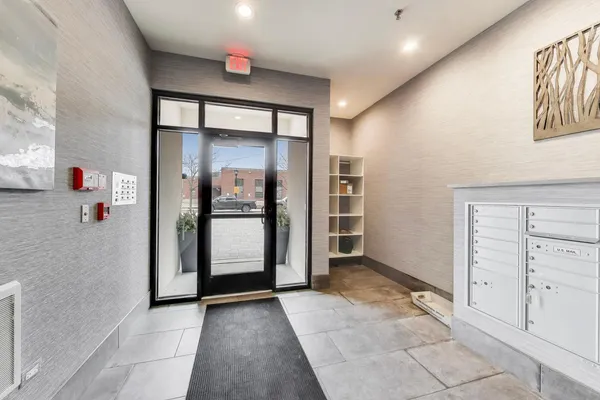 a spacious bedroom with a bed and furniture