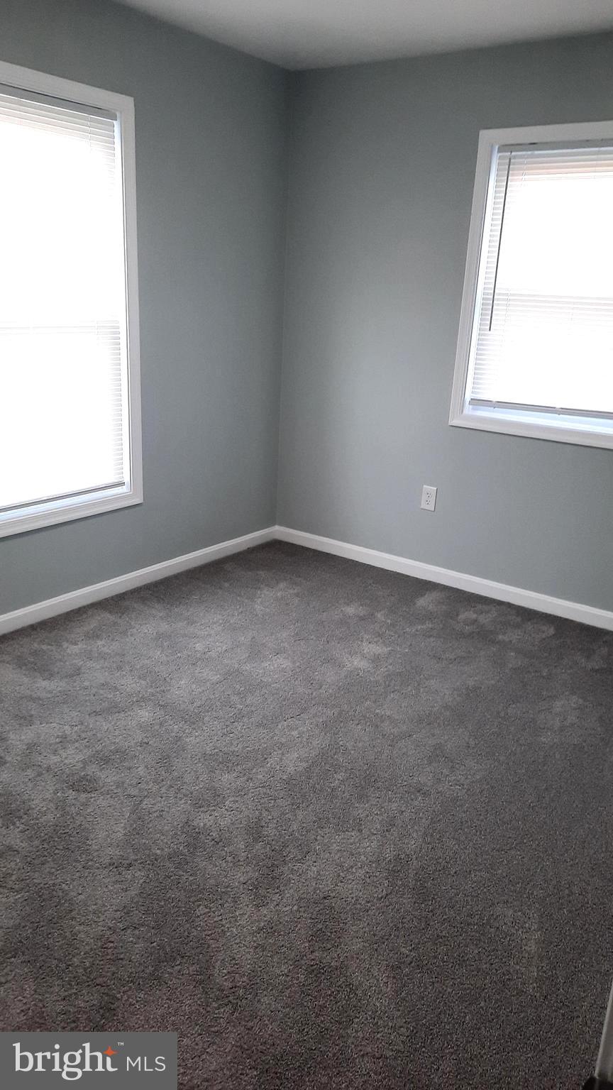 618 Colonial View Road Mechanicsburg, PA 17055 - Photo 14 of 23 an empty room with a window
