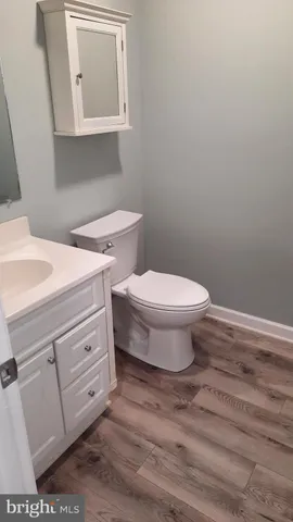 a view of a bathroom with mirror