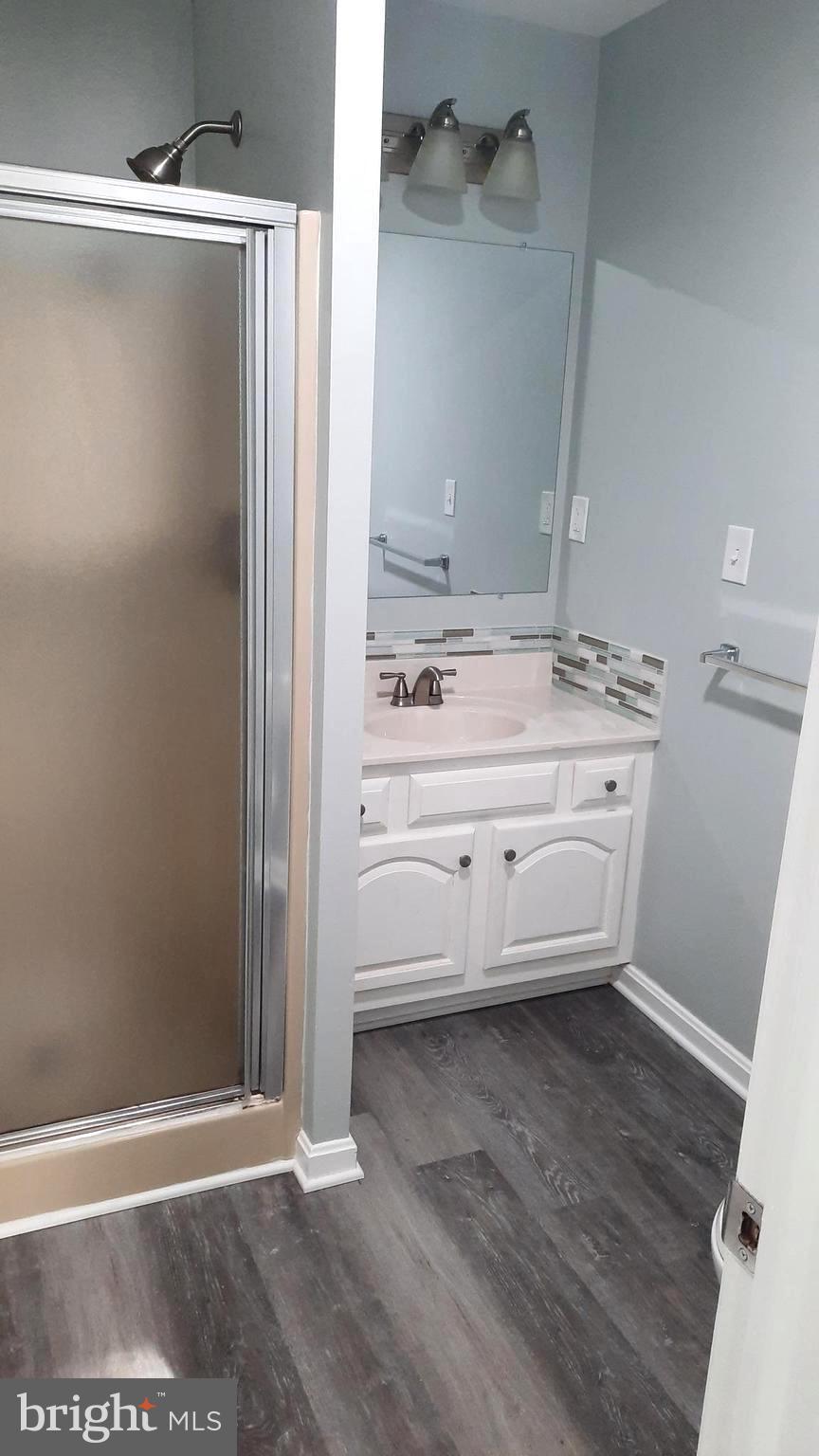 618 Colonial View Road Mechanicsburg, PA 17055 - Photo 17 of 23 a view of a bathroom with mirror